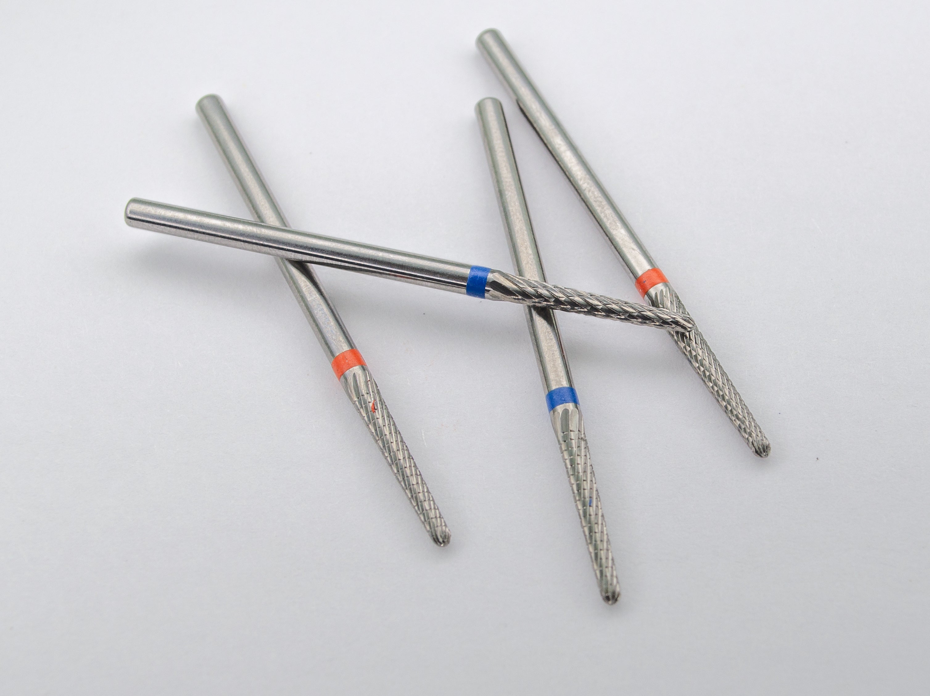 Solid-State Carbide Nail Drill Bits